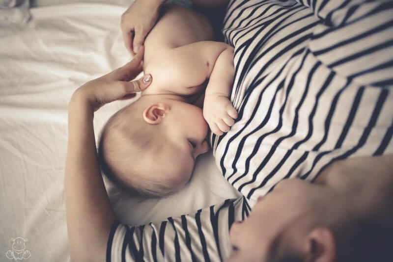 Mom breastfeeding baby with tongue tie