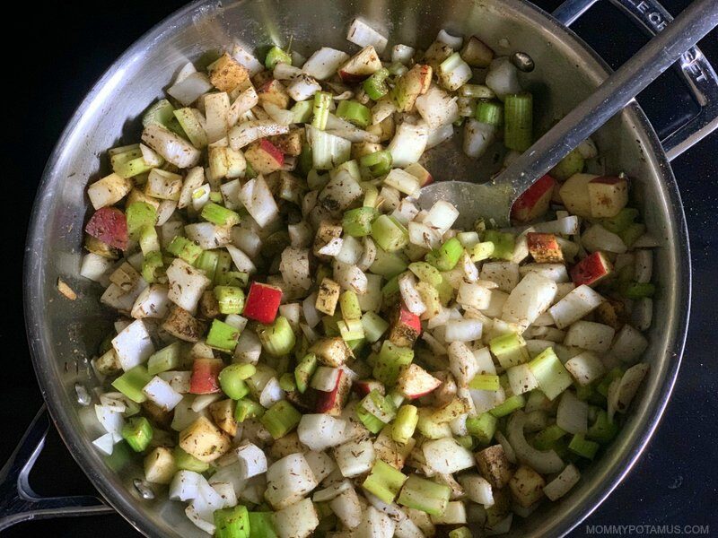 Gluten-free stuffing ingredients cooking in large skillet