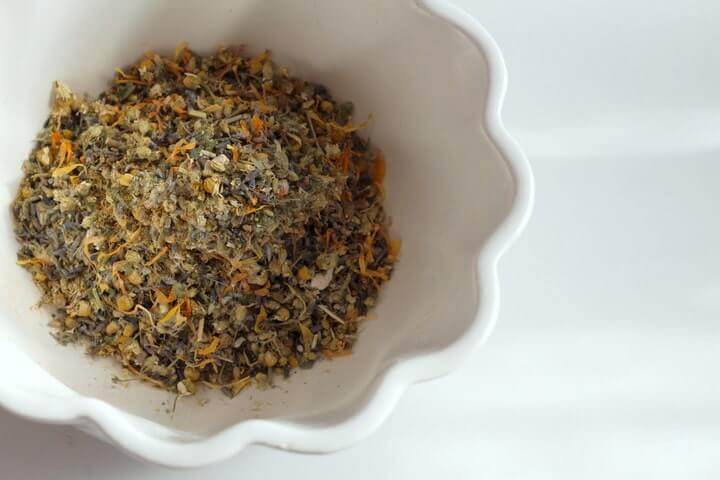 This postpartum herbal sitz bath recipe helps new moms heal and relax by soothing soreness and preventing infection.