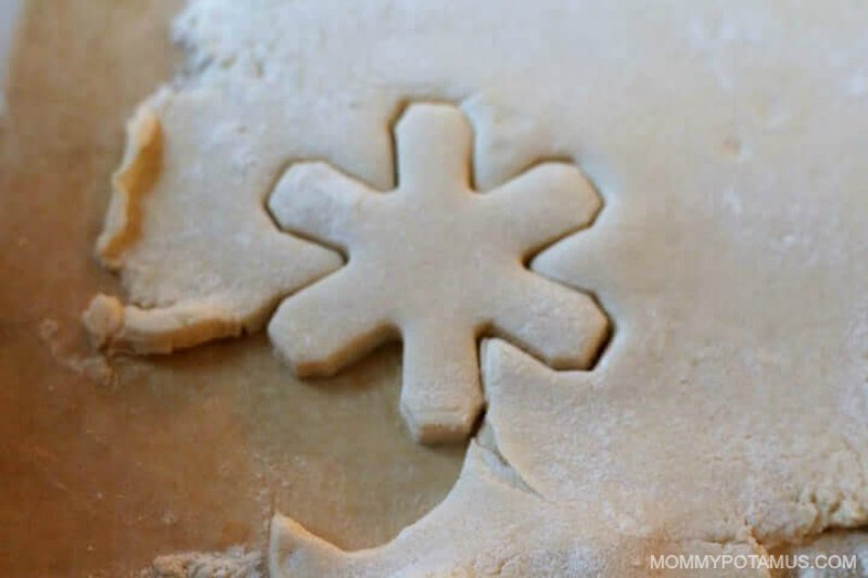 dough cut into the shape of a snowflake