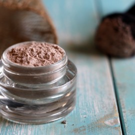 small container of homemade foundation powder
