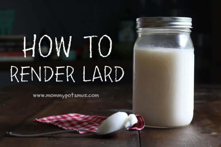 jar of rendered lard next to a spoon