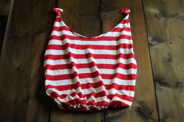 Re-purpose an old t-shirt into a tote bag/ farmer's market bag in 10 minutes. 