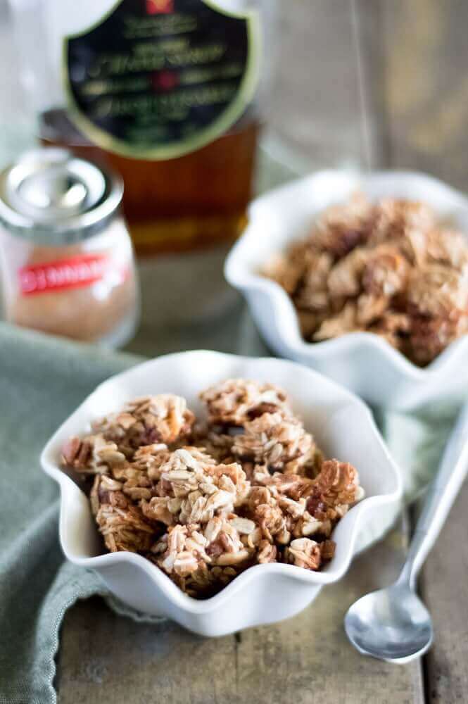 Bowls of healthy homemade granola on table