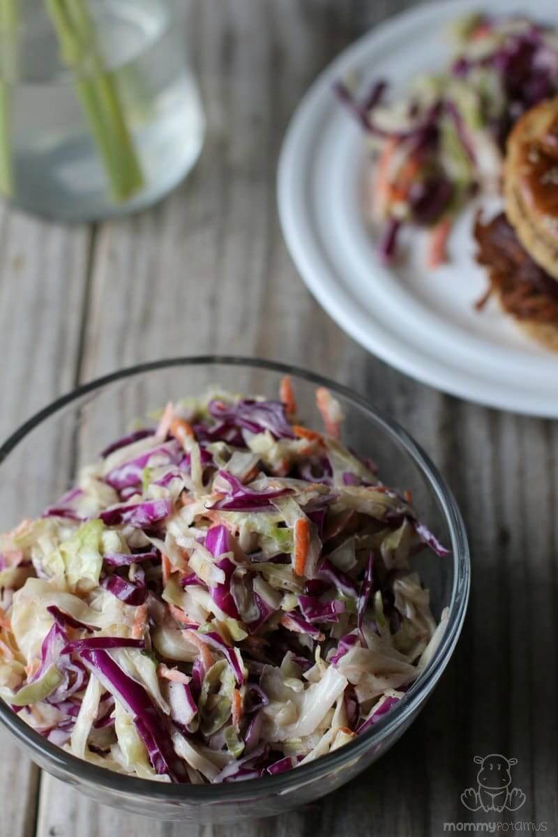 Easy Coleslaw Recipe - Crisp, fresh and tossed in a sauce that is sweet, creamy and tangy, this coleslaw recipe is now one of my - and my kids - favorite side dishes for picnics.