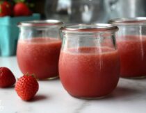 Jars of homemade strawberry jello on counter