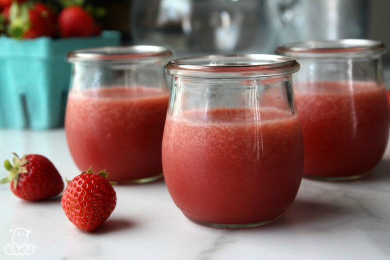 Jars of homemade strawberry jello on counter