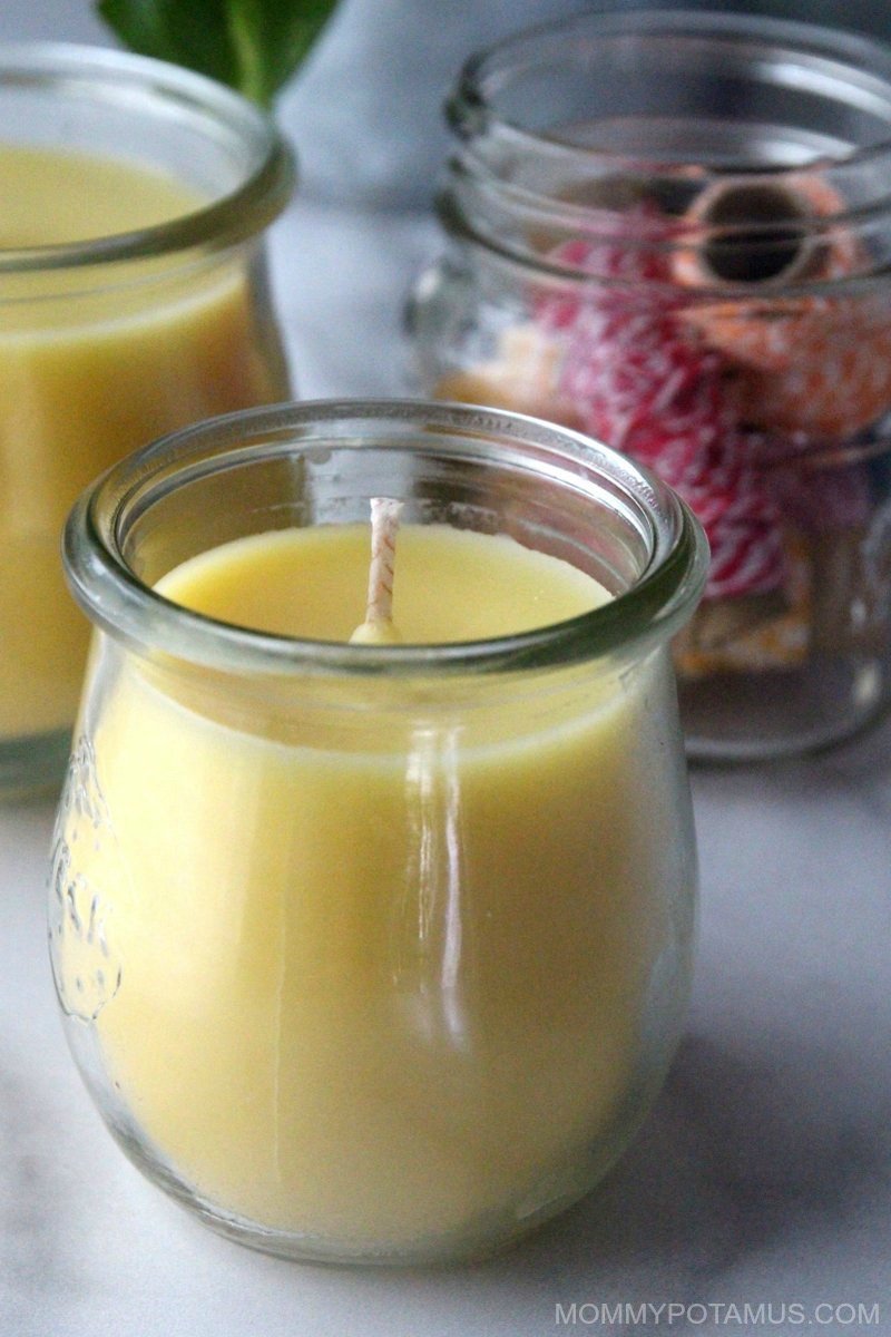 Homemade beeswax candle on table