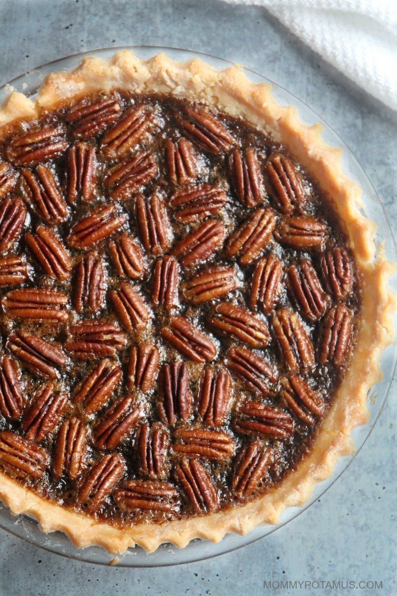 Overhead view of freshly baked pecan pie with maple syrup instead of corn syrup