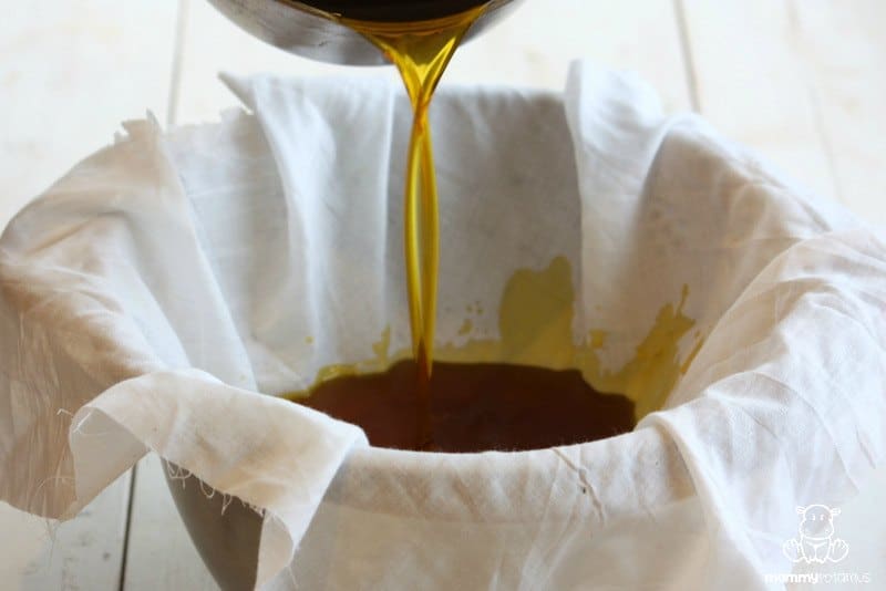 Pouring beeswax through cloth