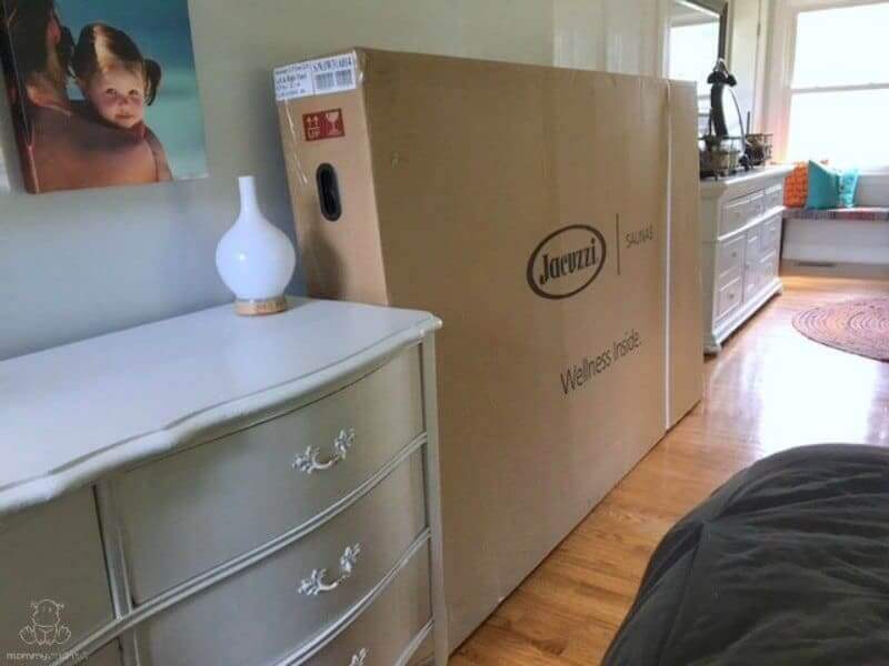 Sauna box in bedroom, ready to be unpacked. 