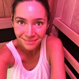Heather sitting in sauna