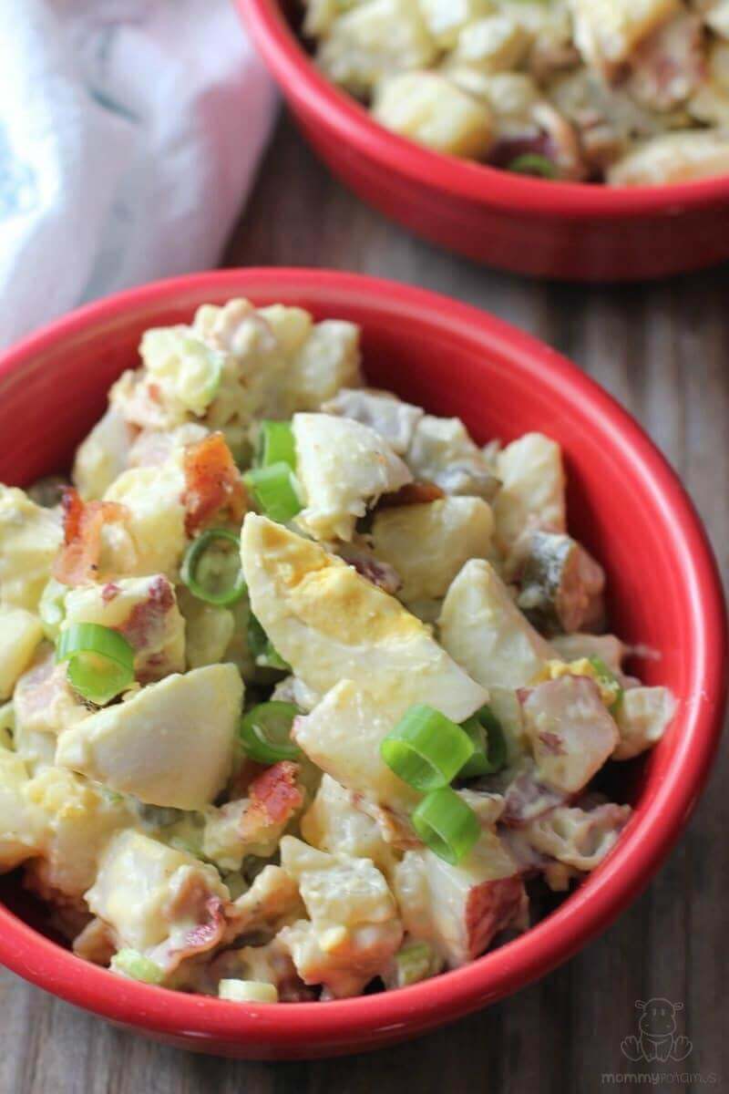Bacon, hearty red potatoes and onion are the star flavors in this potato egg salad recipe. It packs well for a picnic or barbecue, and always gets lots of compliments from guests.
