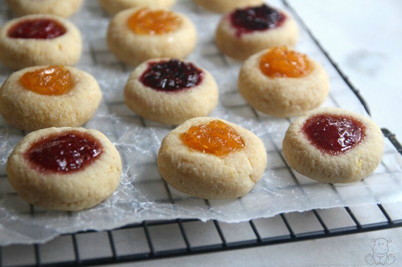 Thumbprint cookies filled with raspberry, blackberry, peach and strawberry jam