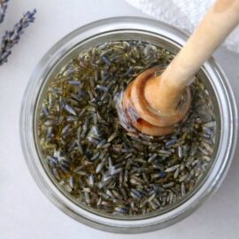 Jar of honey infused with lavender buds