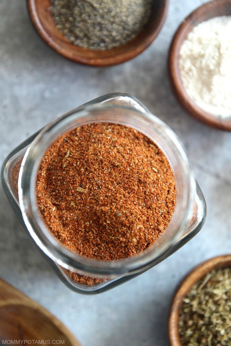 Overhead view of homemade taco seasoning in jar