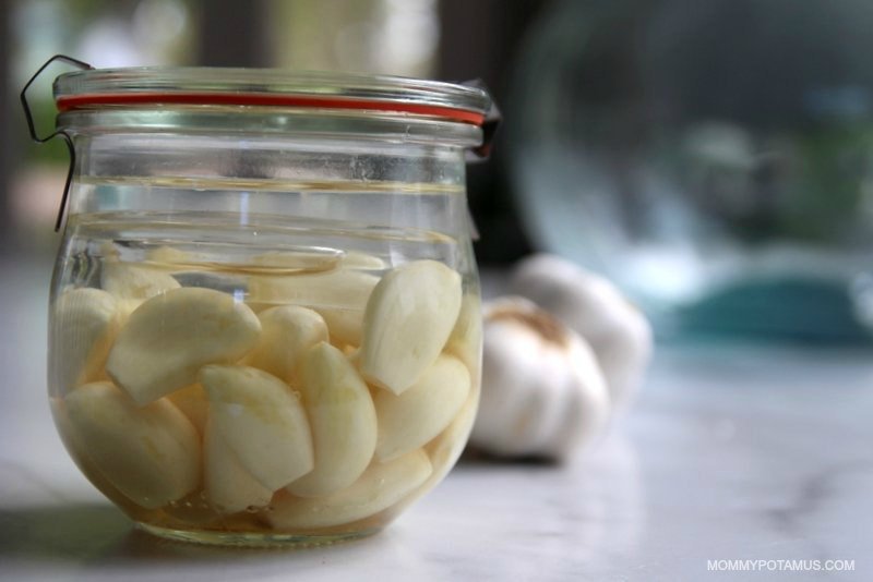 Sealed jar of fermenting garlic