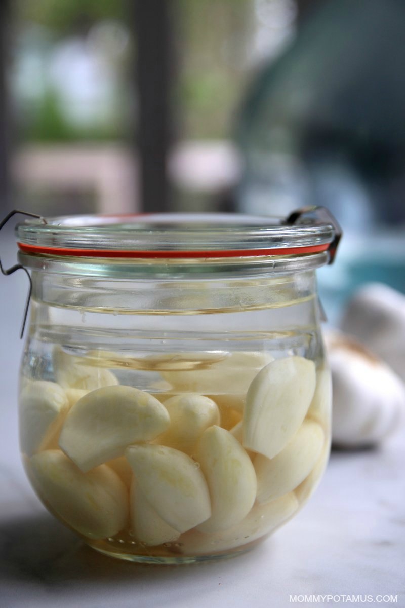 Fermented garlic cloves in a jar