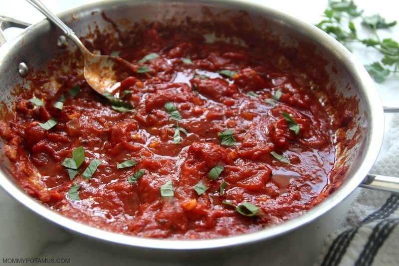 Homemade marinara sauce in stainless steel skillet