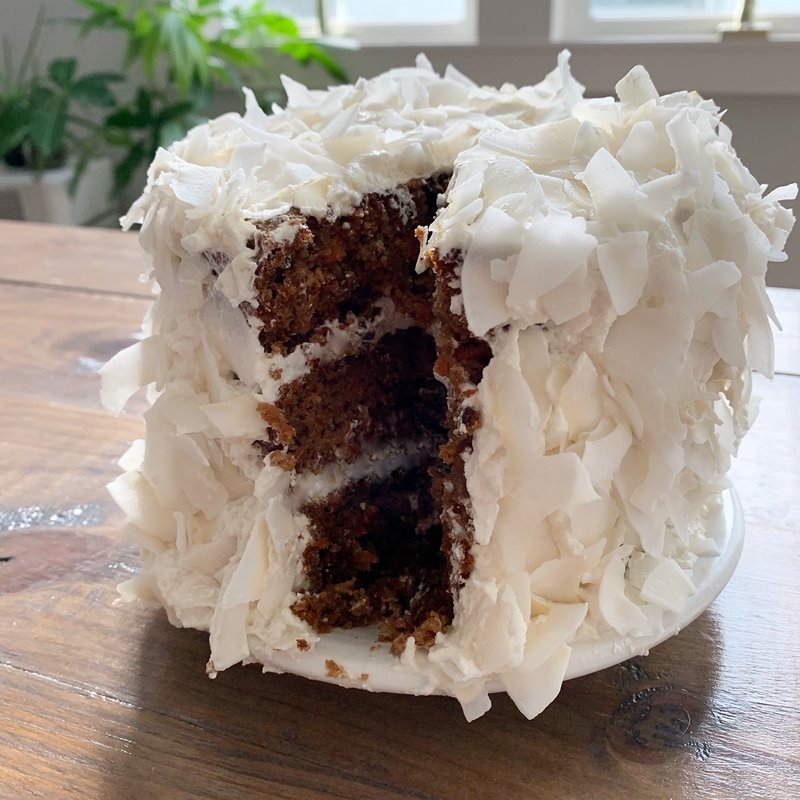 Homemade gluten-free carrot cake on a kitchen table
