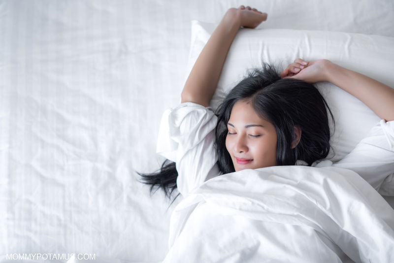 Woman with closed eyes and refreshed expression