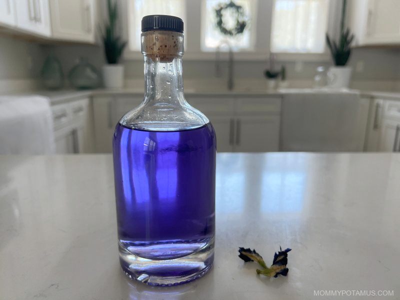 Bottle of butterfly pea flower toner on counter