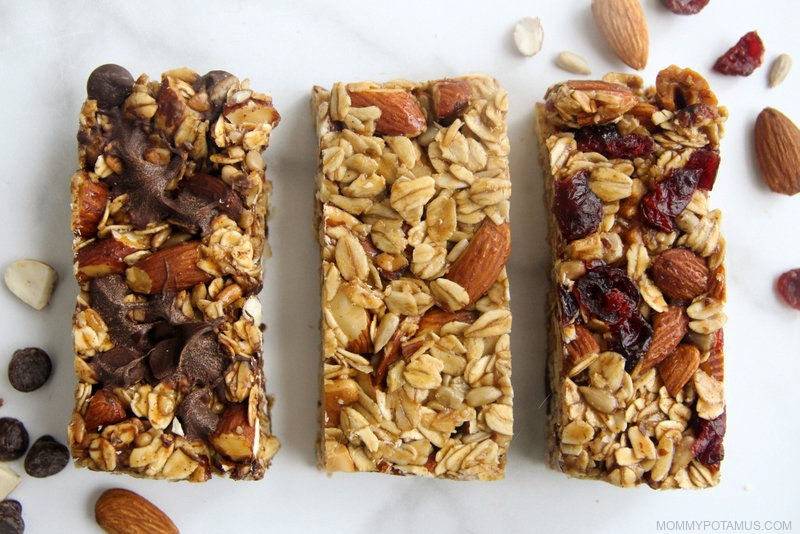 Three granola bar flavors side-by-side: chocolate, plain and dried cranberry