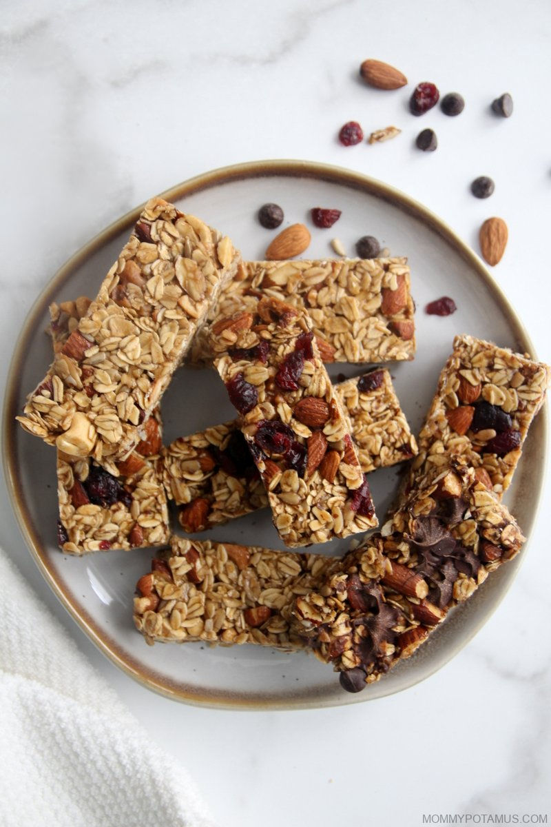 Overhead view of granola bars stacked on a plate