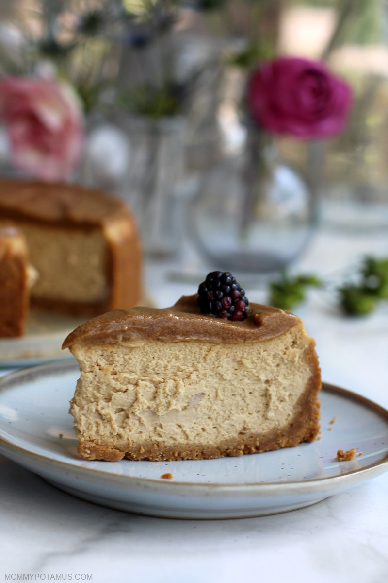 Up close view of caramel cheesecake slice on dessert plate. 