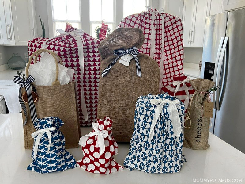 Variety of wrapped gifts on kitchen countertop