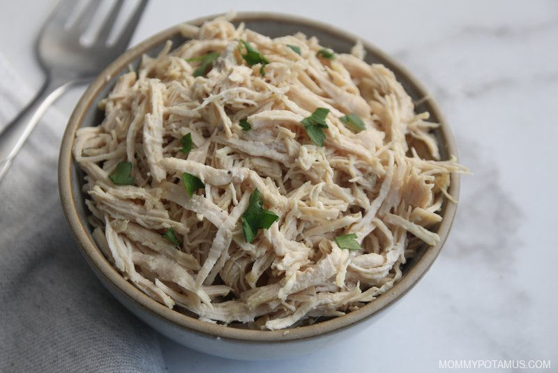 Bowl full of shredded chicken