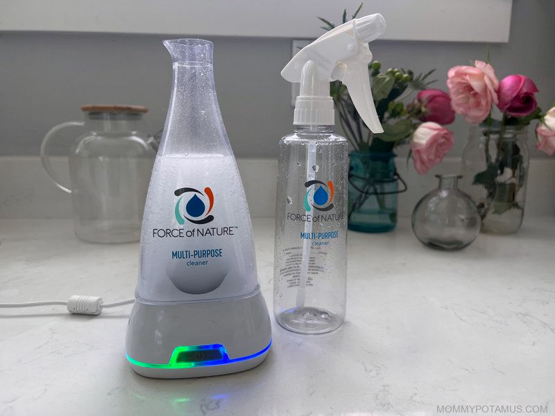 Force of Nature water electrolyzer and spray bottle on kitchen counter
