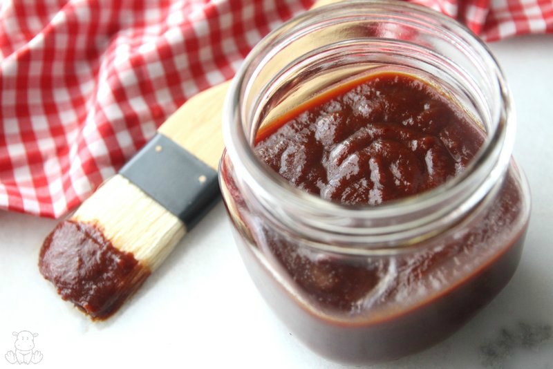 BBQ sauce recipe in jar with basting brush