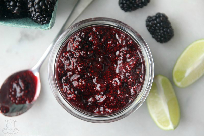 Jar of homemade blackberry jam with spoon